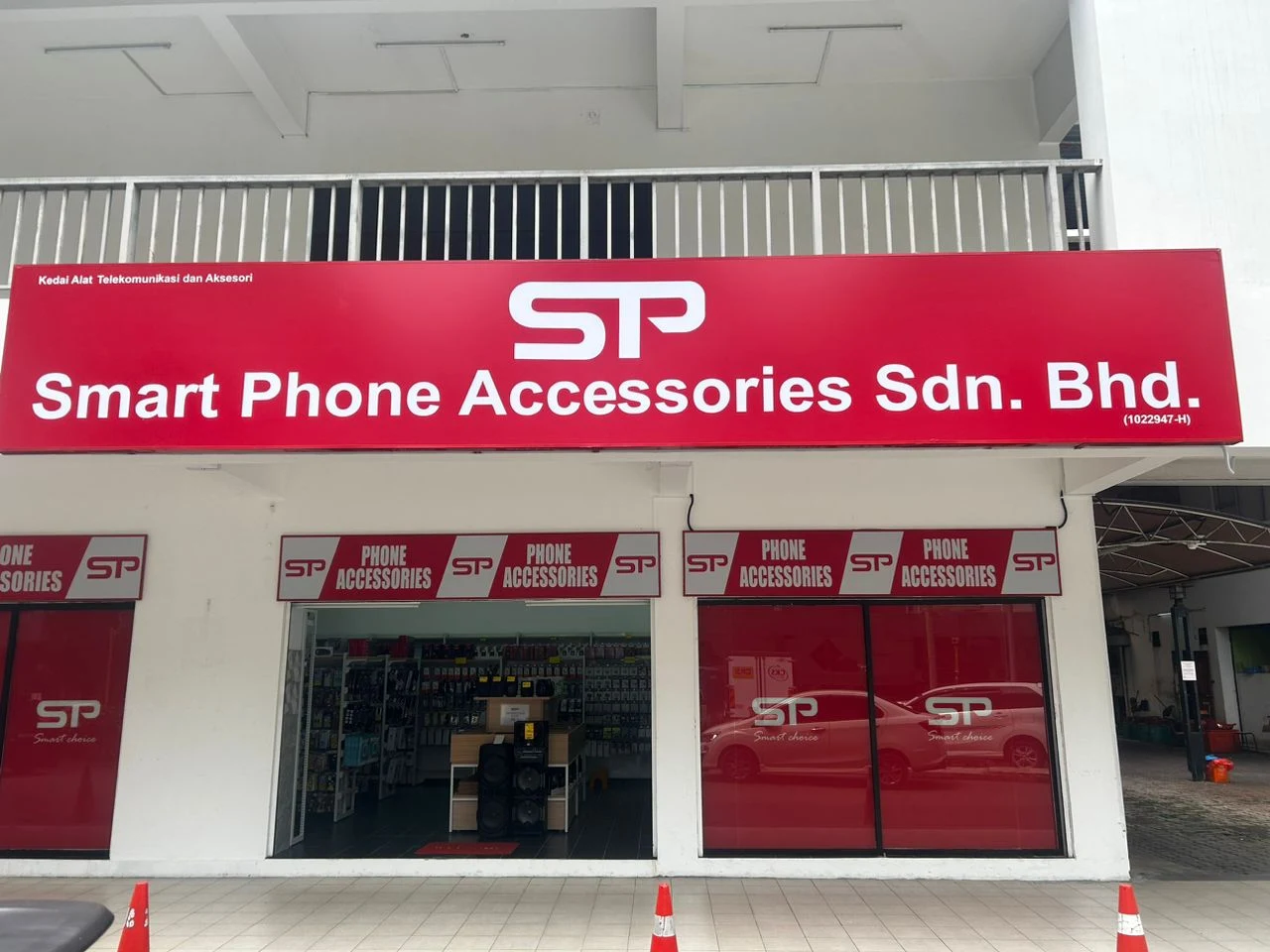 SP Smart Phone Accessories Sdn Bhd storefront with red signboard